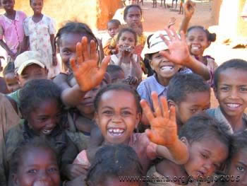Children of Fiadanana in Madagascar waving